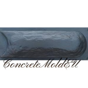 May include: A dark grey concrete mould with a curved, rectangular shape. The mould has rounded edges and a textured surface. The text "Concrete Mold&U" is written in a cursive font at the bottom of the image.