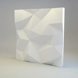 Può includere: Pannello da parete 3D bianco con un motivo geometrico. Il pannello è realizzato in un materiale strutturato e ha un design moderno.