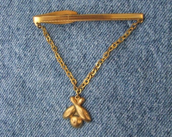 Gleaming gold tone vintage Hickok USA tie clip with bowling pins & ball