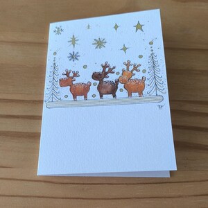 carte fêtes Noël voeux Rennes de Noël  aquarelle  pièce unique signée peinte à la main style minimaliste couleurs lumineuses