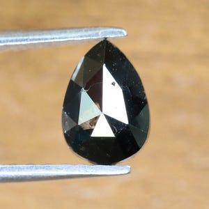 0.56 CT Pear Shape Brilliant Cut Natural Loose Diamond | Heated Black Color | Fancy Black Pear Cut Gem for Unique Jewelry Designs