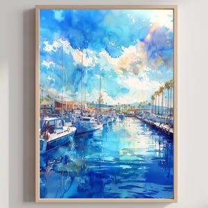 May include: A watercolor painting in a light wood frame depicting a marina with white sailboats docked in calm blue water. The scene features a bright sky with soft clouds, palm trees along the shoreline, and buildings in the background.