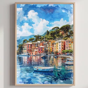 May include: Watercolor painting of a coastal town with colorful buildings and boats in the harbor. The artwork features a bright blue sky with fluffy white clouds and a wooden frame.