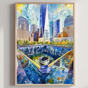 May include: Watercolor painting of the New York City skyline, featuring the World Trade Center and surrounding buildings. The artwork showcases a blue and yellow color palette, with the 9/11 Memorial in the foreground. The painting is framed.