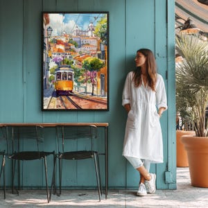 Lisbon Portugal Watercolor Travel Poster Print Lisbon Wall Hanging Home & Office Décor European Art Lovers Gift Portugal Vacation Portuguese. Immerse yourself in the beauty of Lisbon, Portugal, Europe, with our meticulously crafted borderless wall art poster print. This watercolor illustration captures the essence of this iconic Portuguese destination, allowing you to relive cherished vacation travel memories every day. Perfect for home or office décor, or as a gift to an art lover.