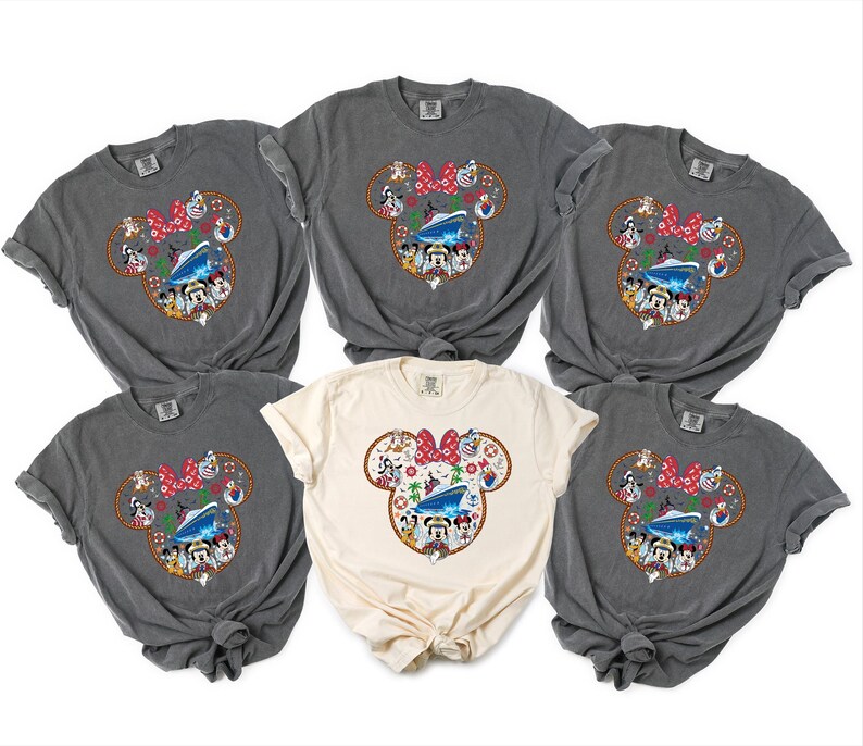 May include: Six t-shirts in shades of grey and cream, each featuring a Minnie Mouse design. The design includes a red bow, a cruise ship, and Disney characters. The shirts are made of soft fabric and have a relaxed fit.
