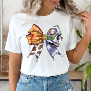 Buzz Lightyear Coquette T-Shirt,Toy Story Pixar Disney Tee,Disney Trip Shirts,Cute Western Space Sweatshirt, Cartoon Bow Graphic Hoodie image 9