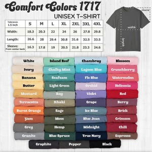May include: A Comfort Colors 1717 unisex t-shirt color chart featuring a grid of forty-eight folded shirts in various shades. Includes a sizing table with width, length, and sleeve measurements in inches for sizes S to 4XL and a diagram of a t-shirt.