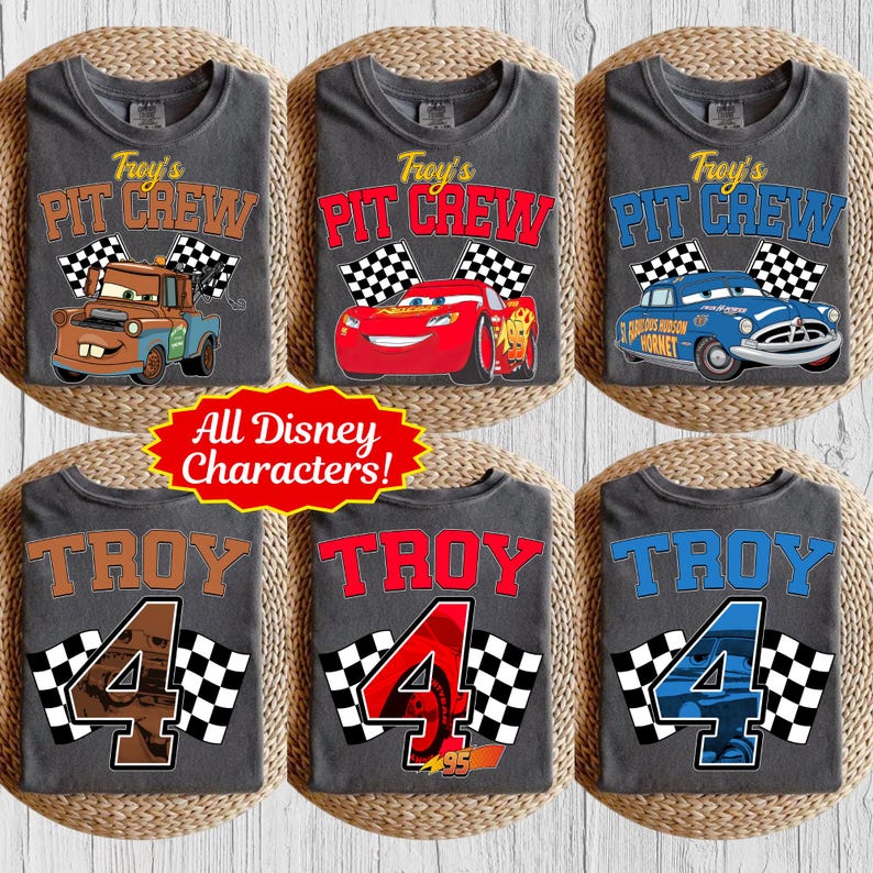 May include: Six gray t-shirts with various Disney Cars graphics. Designs include "Troy's Pit Crew" with Mater, Lightning McQueen, and Doc Hudson. Other shirts say "Troy 4" with race car themes. The text "All Disney Characters!" is also visible.