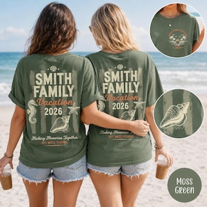 May include: An olive green t-shirt featuring a back graphic with the text SMITH FAMILY Vacation 2026, Making Memories Together, KEY WEST, FLORIDA, alongside illustrations of a seahorse, starfish, and seashell. The front has a small chest logo.