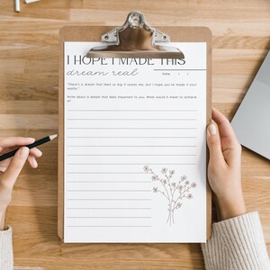 May include: A printable worksheet on a clipboard with the text "I hope I made this dream real."  The worksheet has lines for writing and a small floral illustration.