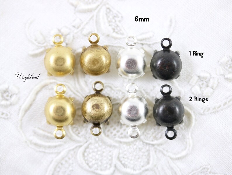 Puede incluir: Seis cierres redondos de metal de 6 mm con un solo bucle o dos bucles. Los cierres est&aacute;n disponibles en oro, lat&oacute;n antiguo, plata y negro.