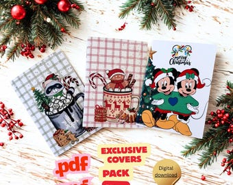 May include: Three Christmas-themed greeting cards with festive illustrations. One card features Mickey and Minnie Mouse, another has a gingerbread man in a mug, and the third shows a raccoon with marshmallows. The image includes text that says "EXCLUSIVE COVERS PACK X46" and "Digital download".