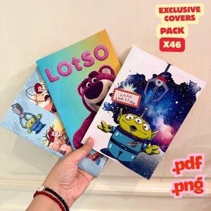 May include: A stack of three colorful notebooks featuring characters from the animated film Toy Story. The covers display Lotso, an alien, and other characters. The notebooks are labeled "EXCLUSIVE COVERS PACK X46", with "pdf" and "png" text.