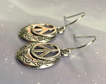 Serene Silvers: Peaceful Dangle Earrings