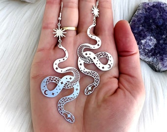 Celestial silver slithering snake earrings, witchy snake earrings, moon phase etched snakes, sunburst snake earrings, mystical snake jewelry