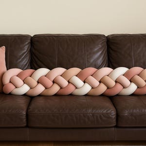 May include: A set of three ceramic mugs with a speckled, matte finish. Each mug features a different color: light blue, cream, and gray. The mugs have a simple, modern design and a comfortable handle.