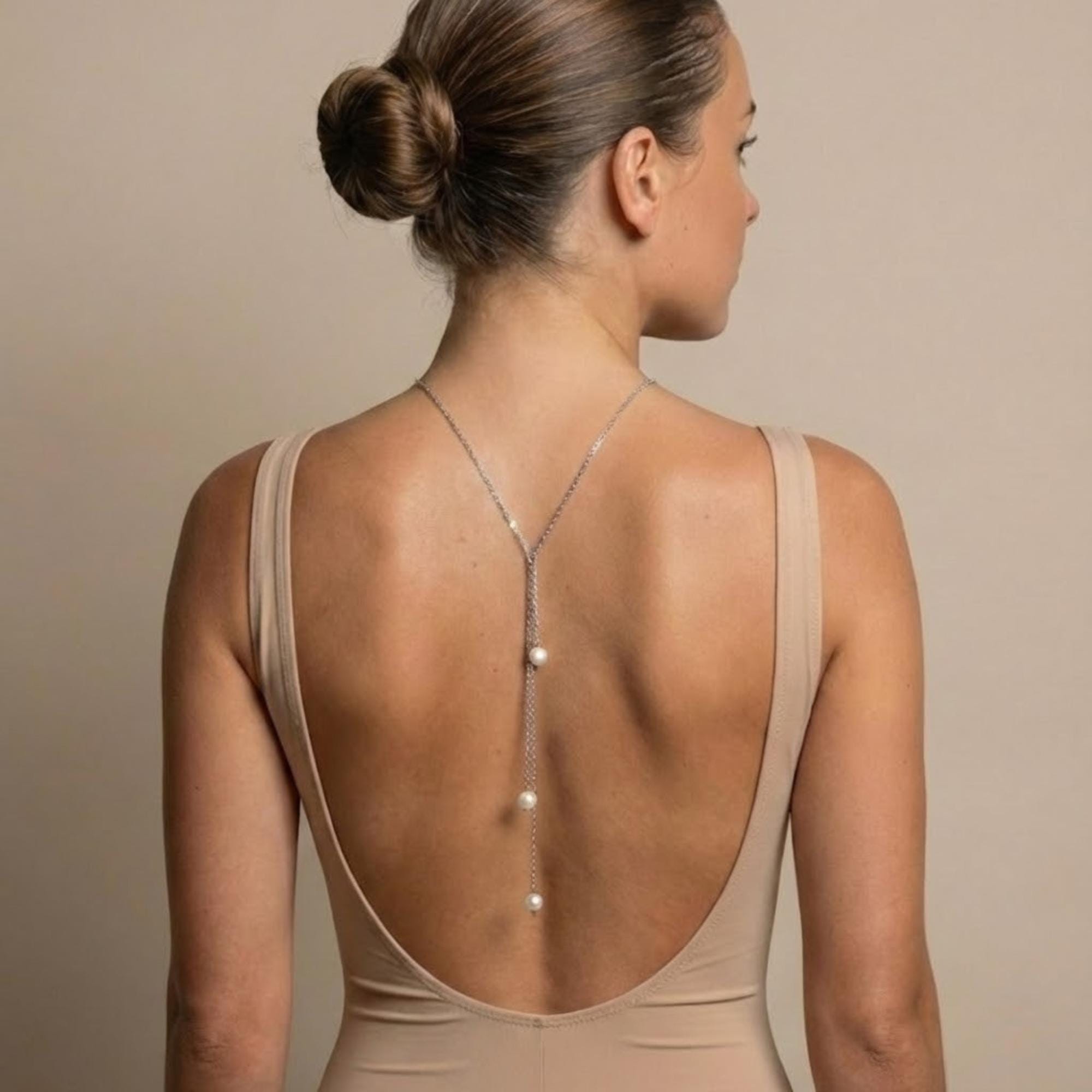 Gold tone stainless steel pearl lariat back body chain for open-back gown styling