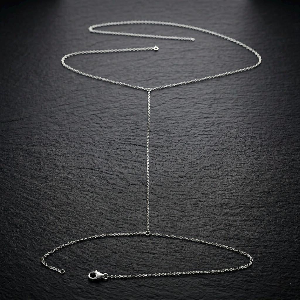 Delicate gold tone stainless steel thigh chain body jewelry for festival wear and editorial styling