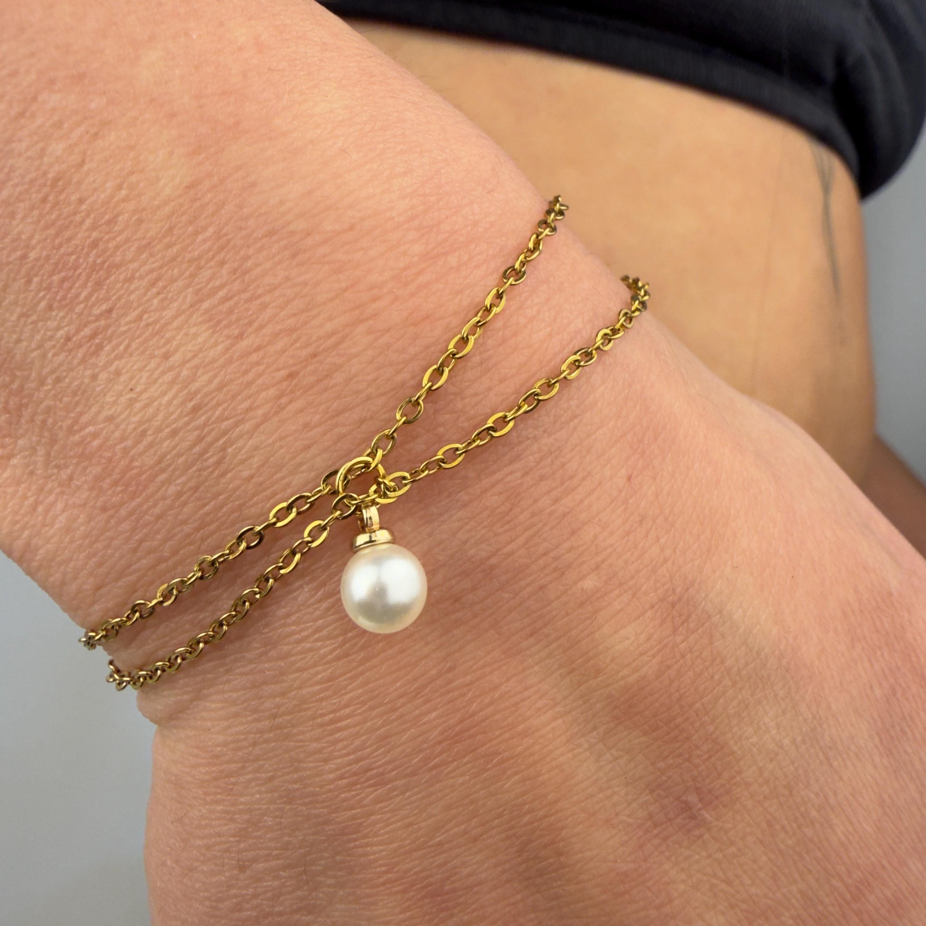 Delicate gold stainless steel pearl charm bracelet with dual strands for everyday wear