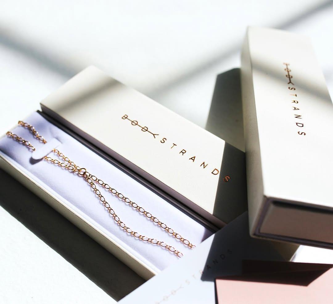 Dainty gold zodiac necklace with personalized star sign charm, stainless steel slip-on chain design