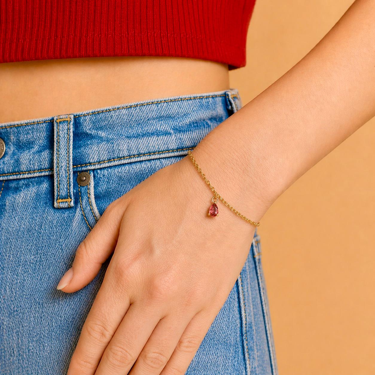 Dainty gold stainless steel birthstone bracelet with personalized gemstone charm for everyday wear