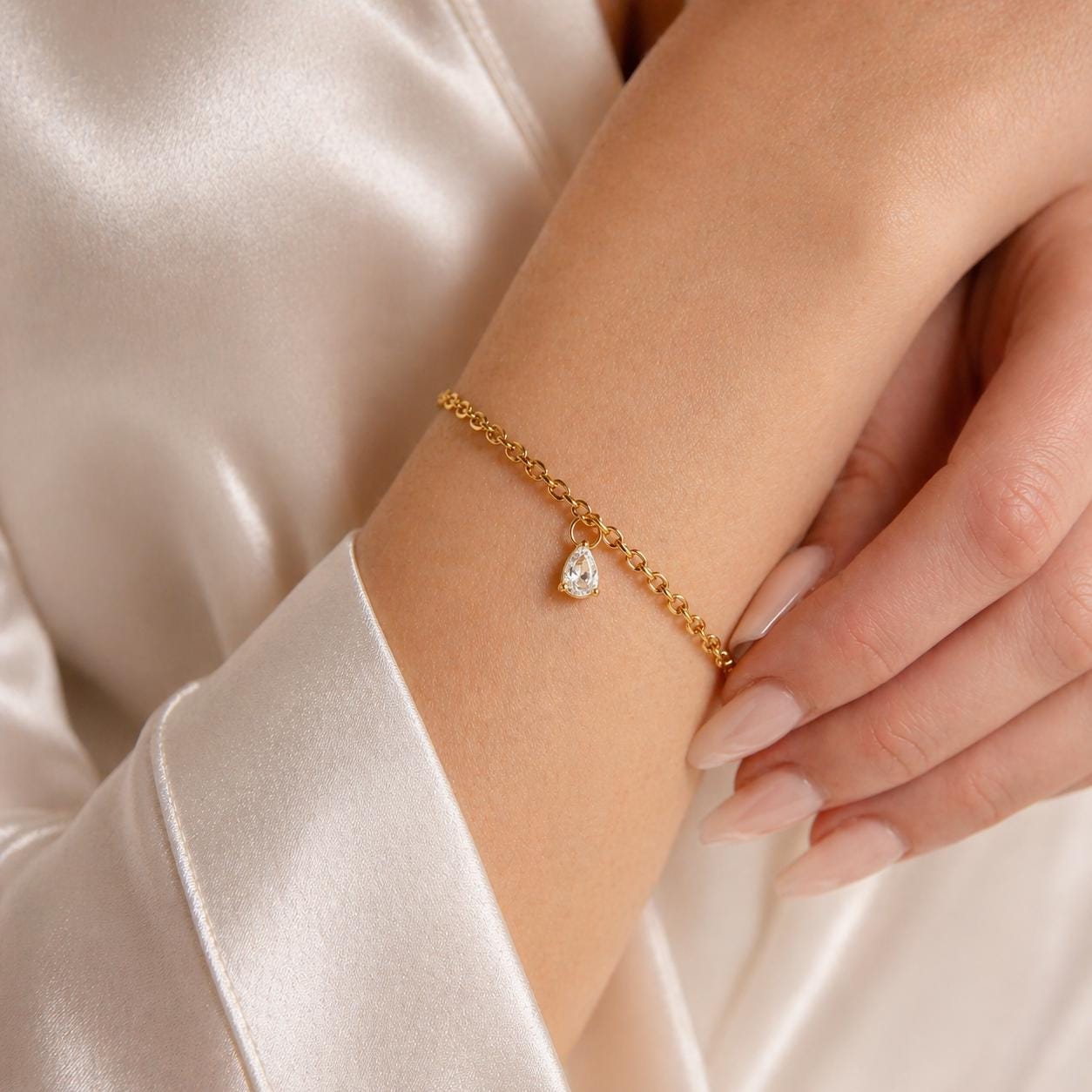 Dainty gold stainless steel birthstone bracelet with personalized gemstone charm for everyday wear