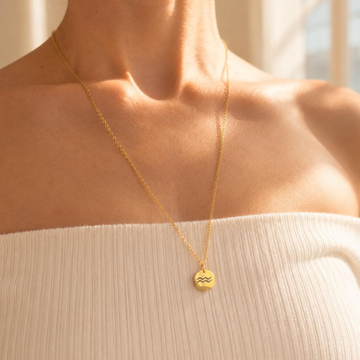 Dainty gold zodiac necklace with personalized star sign charm, stainless steel slip-on chain design