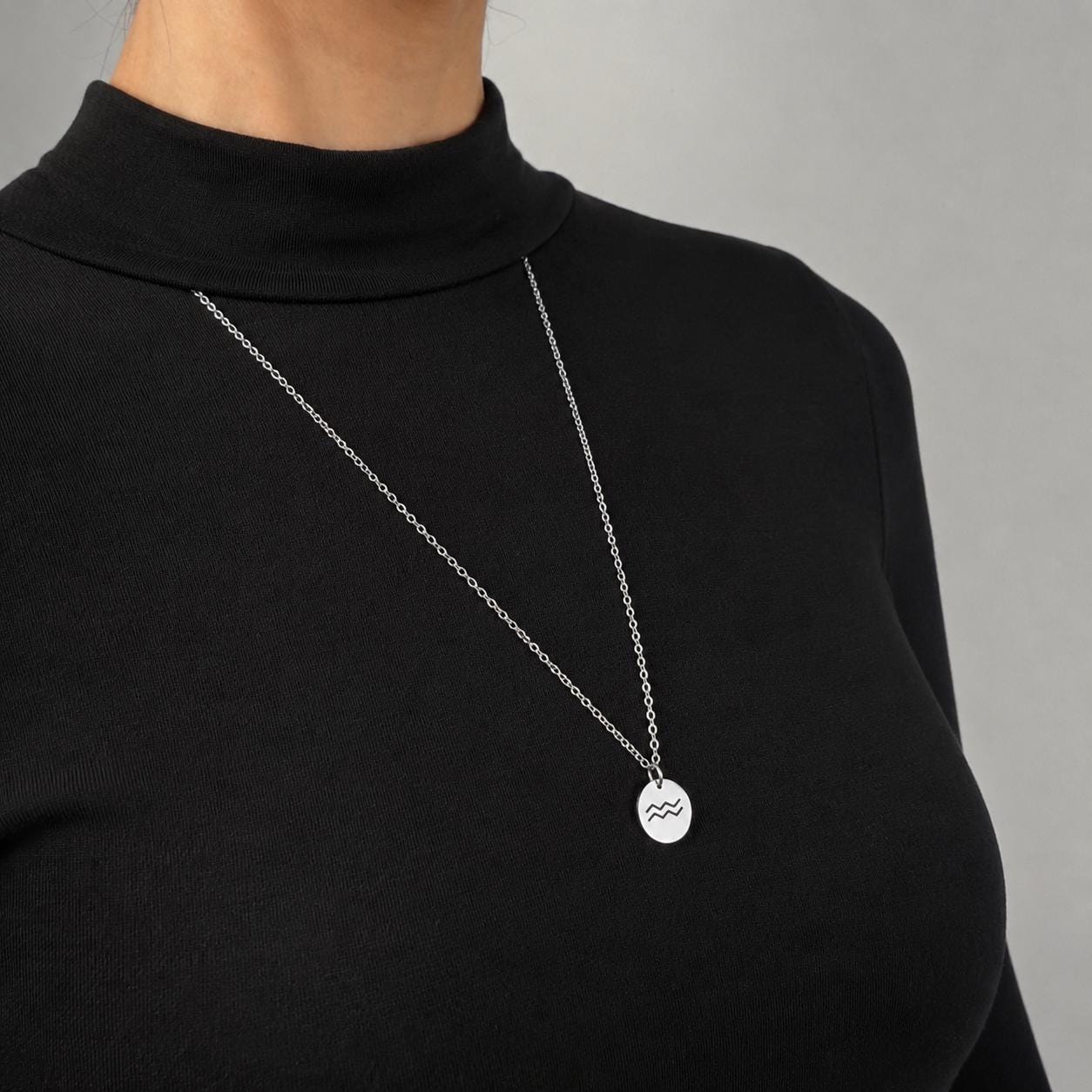 Dainty gold zodiac necklace with personalized star sign charm, stainless steel slip-on chain design