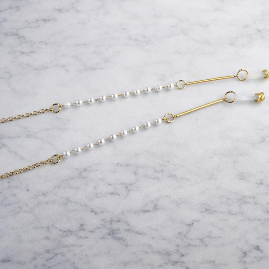Delicate gold-tone stainless steel pearl glasses chain with elegant pearl accents for eyewear