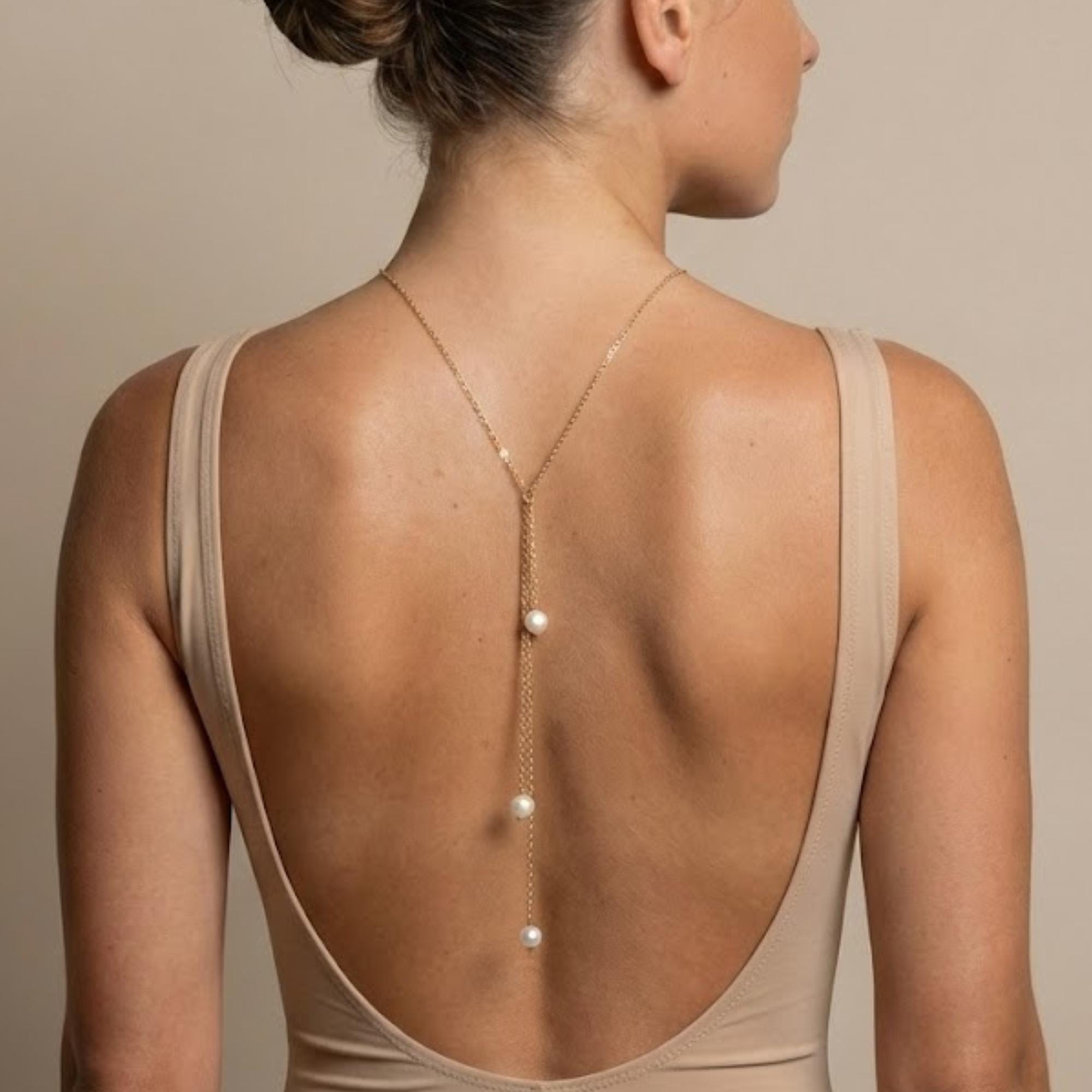 Gold tone stainless steel pearl lariat back body chain for open-back gown styling