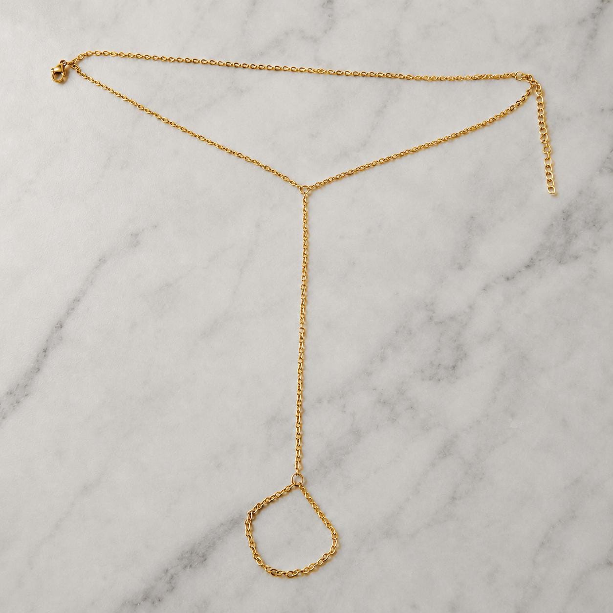 Delicate gold tone stainless steel barefoot sandal ankle bracelet for beach weddings and summer barefoot jewelry styling.