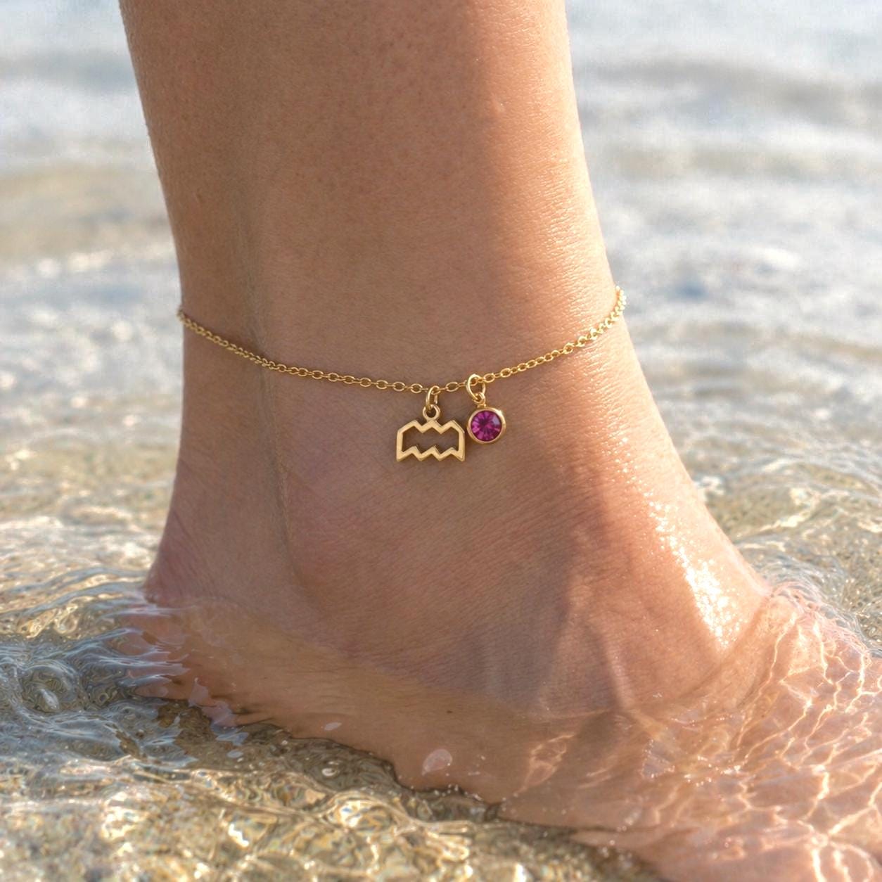 Delicate gold stainless steel beach anklet with zodiac charm and birthstone gemstone pendant