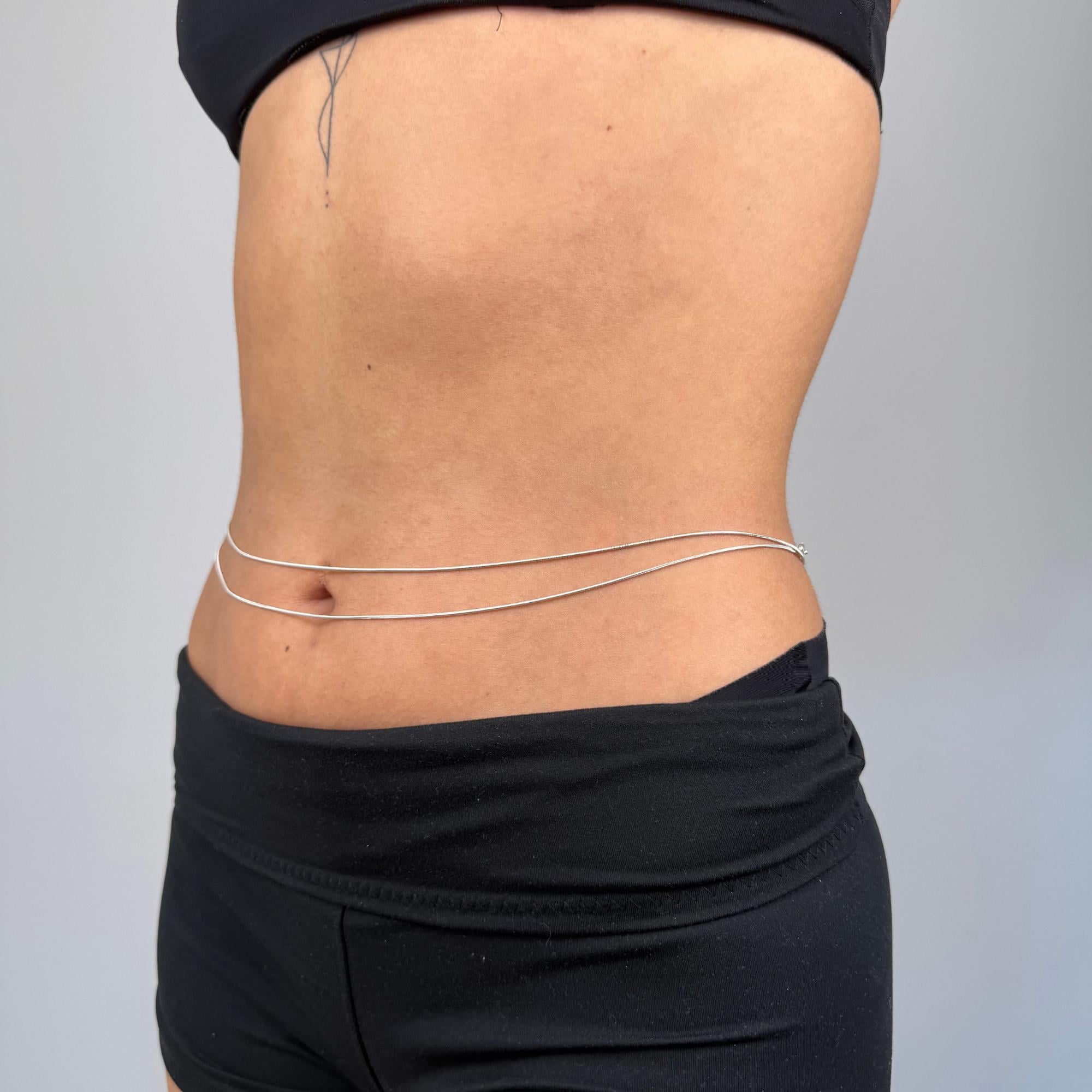 Delicate layered silver belly chain in stainless steel, minimalist waist accessory for beach and everyday wear