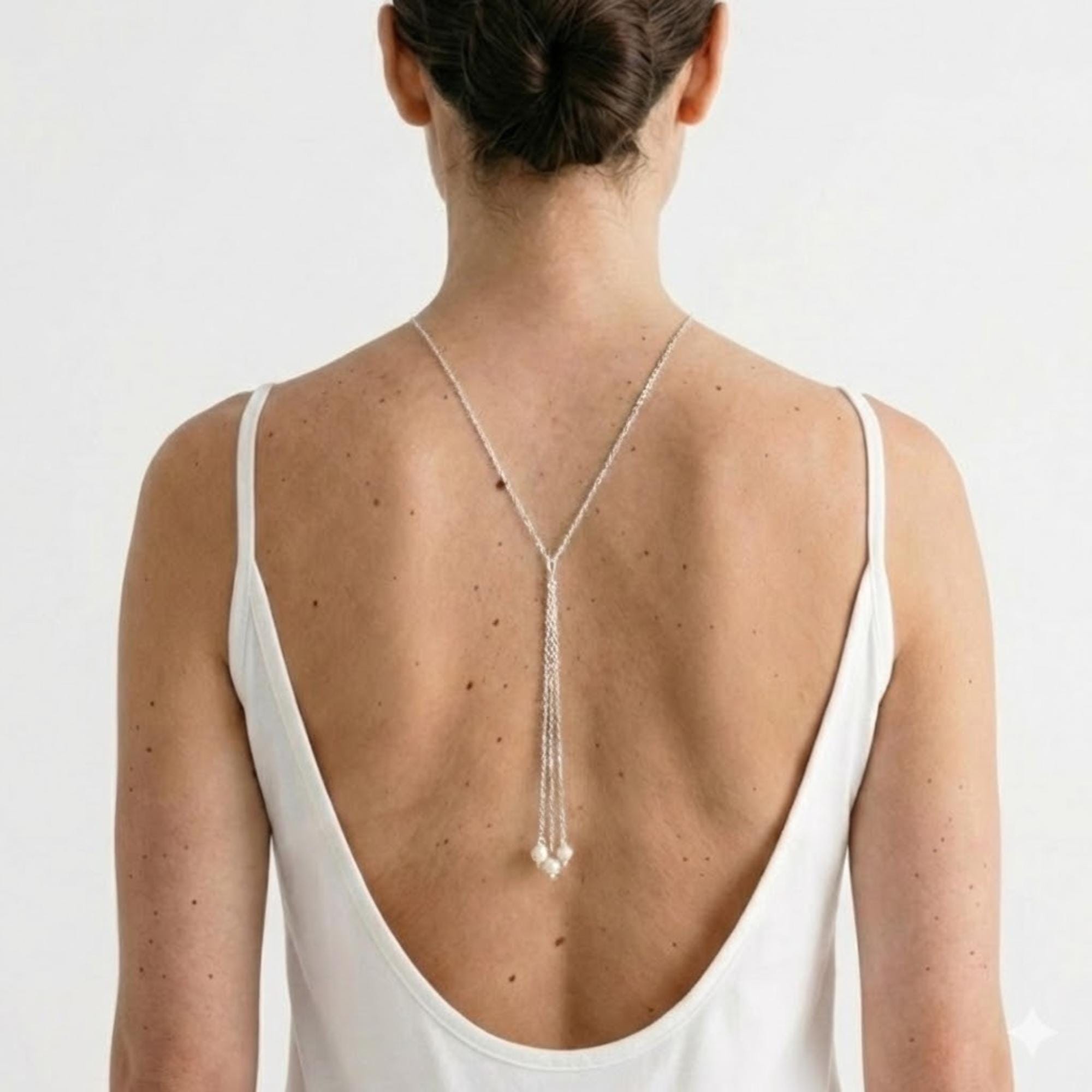 Reversible pearl lariat back chain in gold stainless steel, versatile front necklace or open-back body jewelry for women