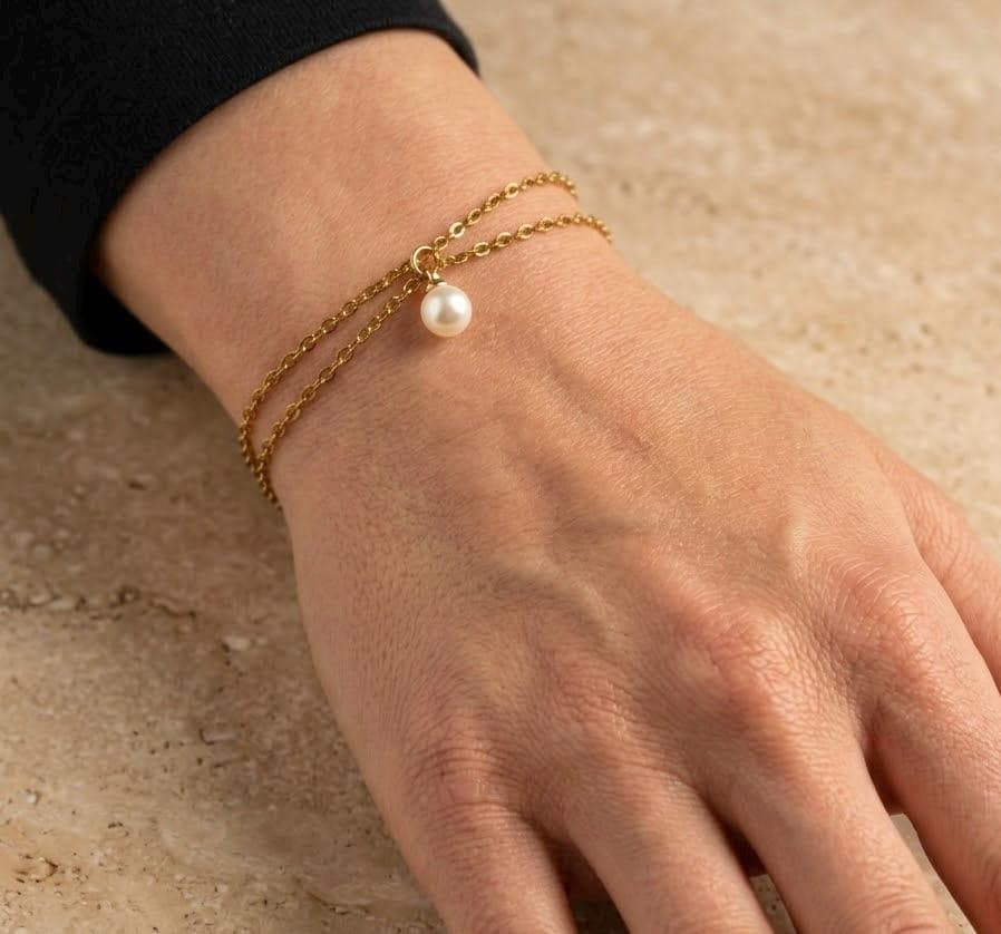 Delicate gold stainless steel pearl charm bracelet with dual strands for everyday wear