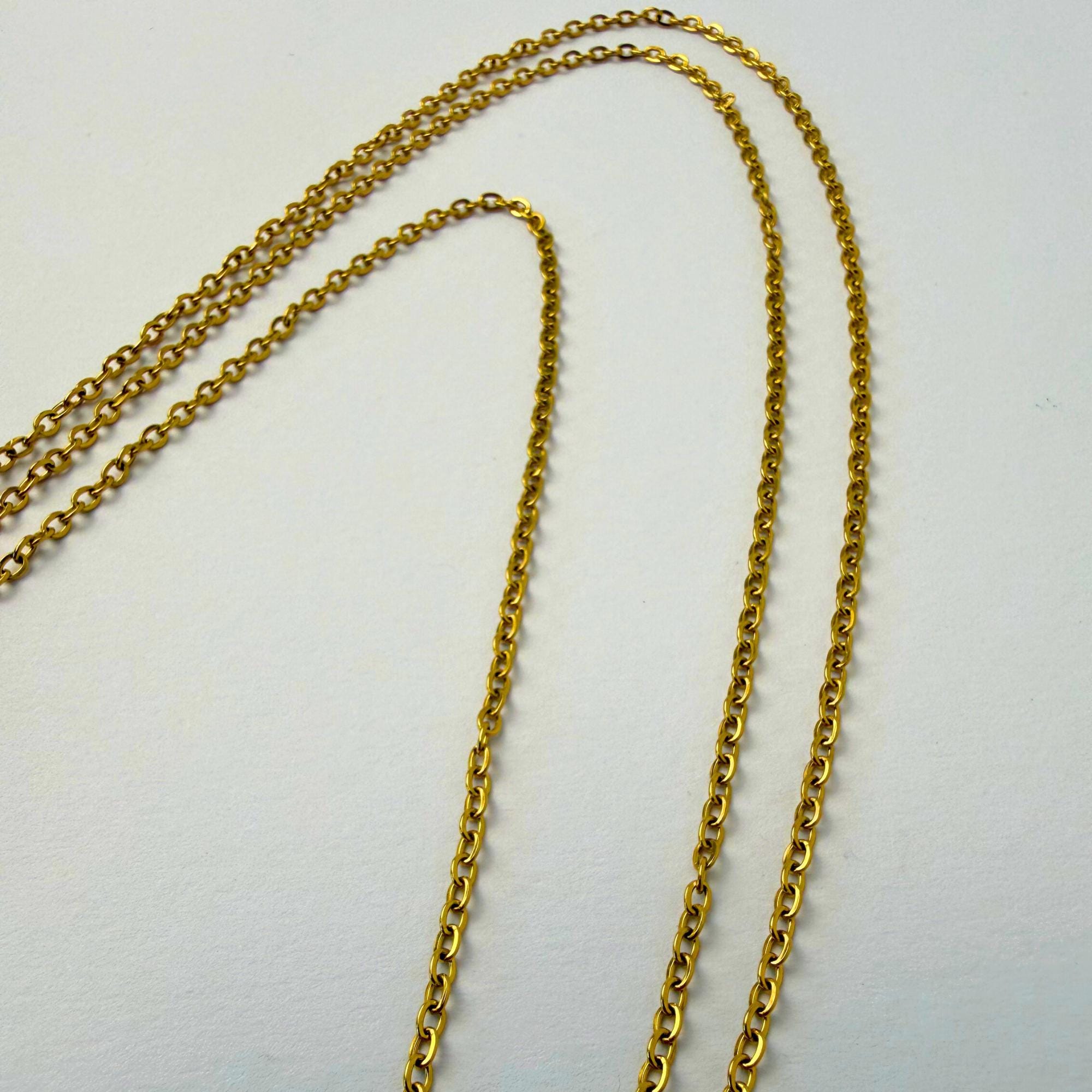 Gold tone stainless steel belly chain for layered waist styling and beach body jewelry