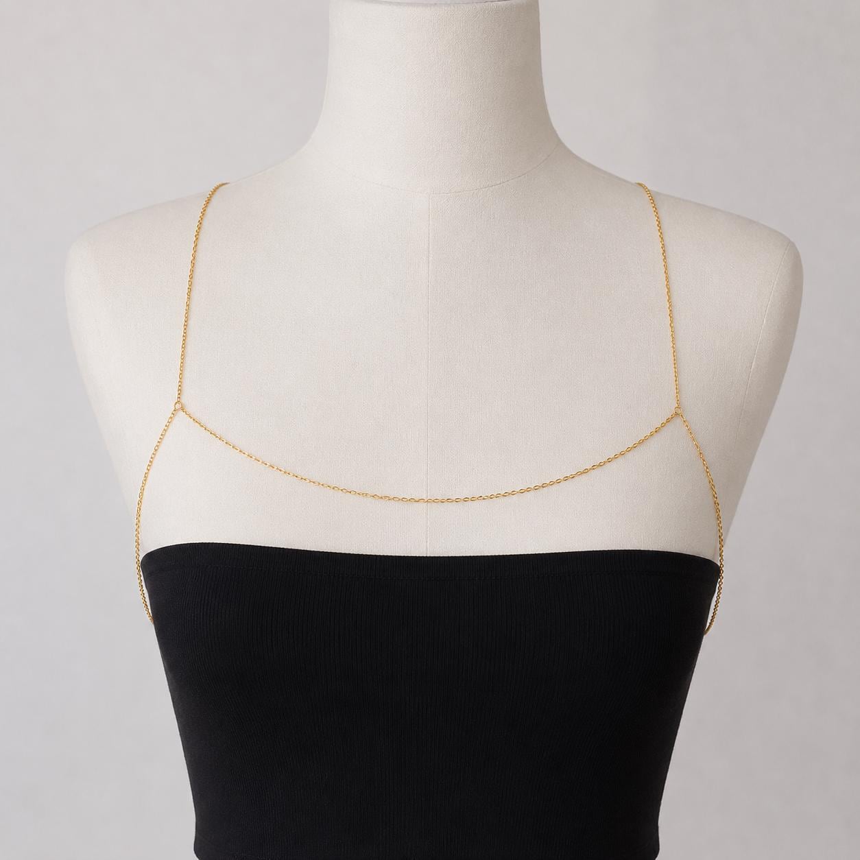 Gold tone stainless steel off-shoulder chain necklace for elegant décolletage jewelry styling