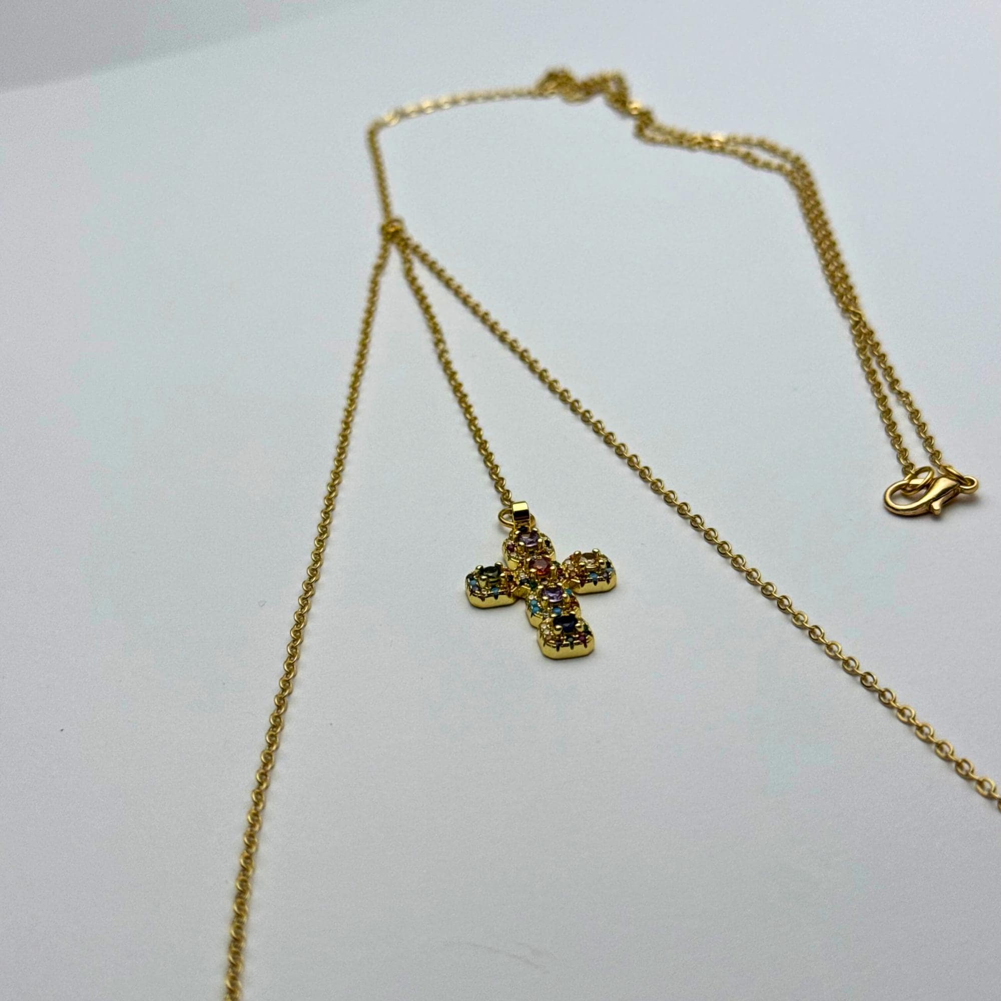 Gold-tone stainless steel cross body chain perfect for festival wear and everyday layering