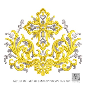 Puede incluir: Un diseño de cruz dorado ornamentado con detalles intrincados, con una forma de cruz central y adornos decorativos. El diseño incluye acentos plateados y delicados elementos en forma de hojas. El texto "TAP TBF DST VEP JEF EMD EXP PES VP3 HUS XXX" está en la parte inferior.