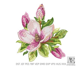 May include: An embroidery design featuring a central blooming magnolia flower with pink and white petals, surrounded by green leaves and several closed pink buds. The text DST JEF PES TBF VEP EMD EXP VP3 HUS XXX is printed below the flower.