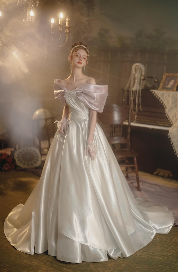 Off-shoulder A-line Wedding Gown: Hand-cut Laser Luster Bridal