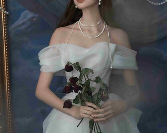 Ethereal Silk Organza Wedding Dress: Handmade Lace, Pearl Necklace Skirt