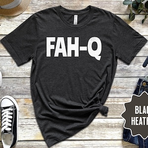 May include: A dark heather grey t-shirt with the text "FAH-Q" printed in white on the front.