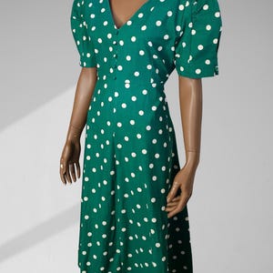 Polka dot green midi dress with puffy sleeves size L ties in the back