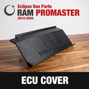 May include: A black plastic ECU cover for a RAM ProMaster 2014-2020 van. The rectangular component features a molded Eclipse Van Parts logo and text on its surface. The text Eclipse Van Parts, RAM PROMASTER 2014-2020, and ECU COVER are visible.
