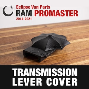 May include: A black 3D-printed transmission lever cover for a RAM ProMaster 2014-2021 van. The part features a textured, umbrella-like top section and a base with the embossed text EVP and a circular logo. The text Eclipse Van Parts is visible.