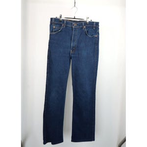 Vintage Levi's 517 Orange Tab Medium Wash Boot Cut Denim Jeans W32.5 Men's