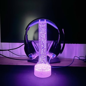 Support casque lumineux pour bureau, support de casque de jeu RVB avec 16 lumières colorées pour décoration de salle de jeux, cadeaux de Noël cool pour gamer pour homme petit ami