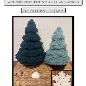 May include: Two plush, textured evergreen trees in dark green and light blue, each with a brown base. A white crocheted snowflake is displayed in a corner inset. Text reads: EVERGREEN TREE + SNOWFLAKE, WITH TREE SKIRT, TREE TOP, & GARLAND OPTIONS, PDF PATTERN + PICTURES.